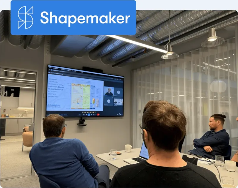 Shapemaker team watching a presentation on data migration from engineering software